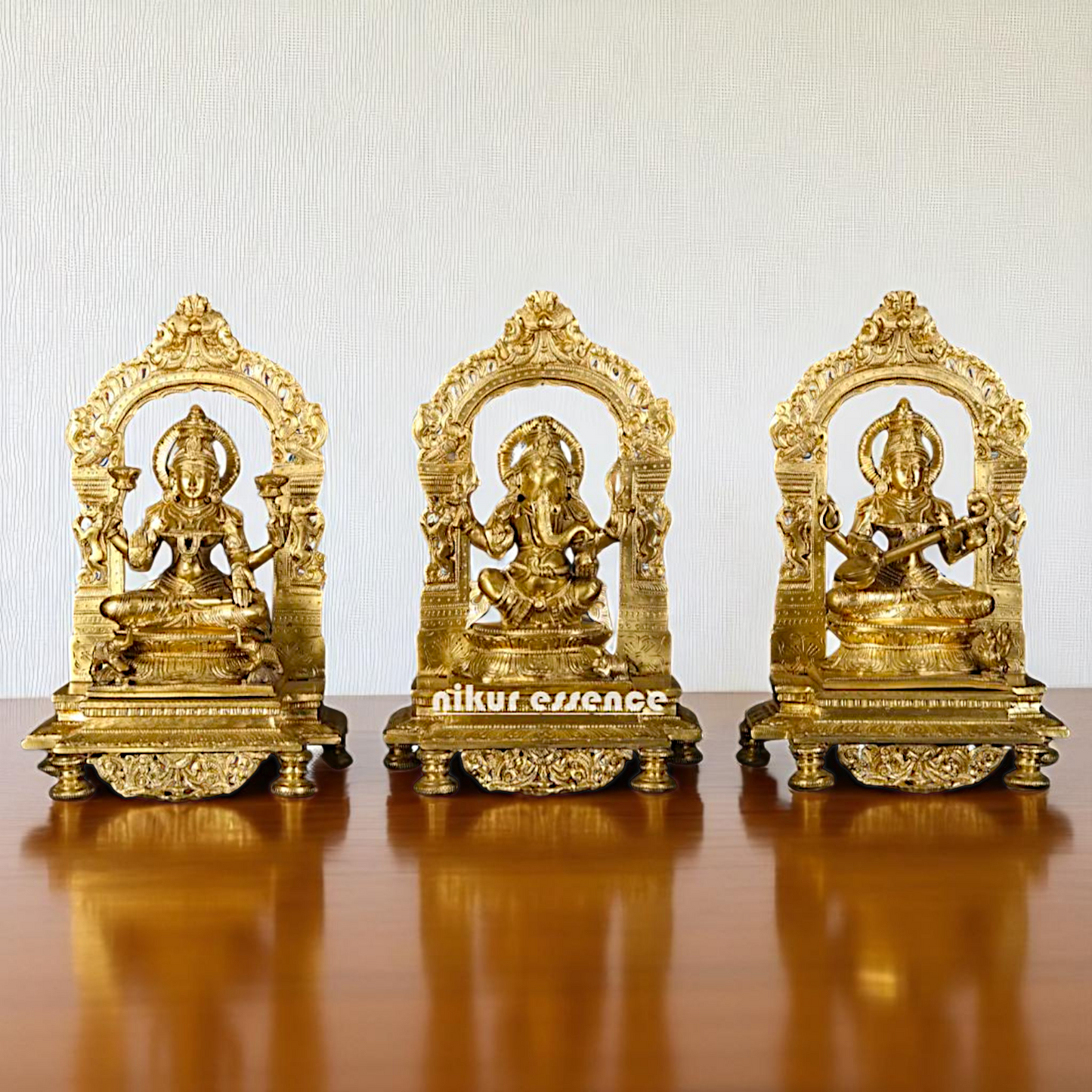 Goddess Lakshmi Ganesha Saraswati Seated on throne kirtimukha with Blessing Bronze/Panchaloha idol - 1 Feet Nikuressence