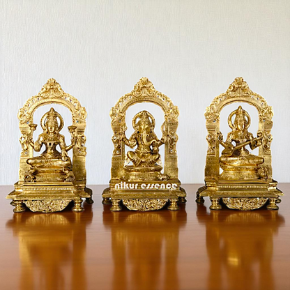 Goddess Lakshmi Ganesha Saraswati Seated on throne kirtimukha with Blessing Bronze/Panchaloha idol - 1 Feet Nikuressence