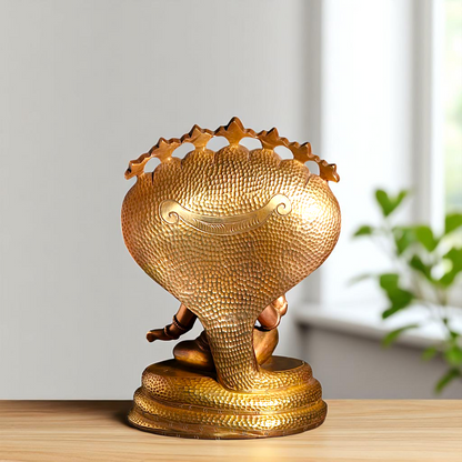 Bronze/Panchaloha Ganesha seated on sheshnag statue - 7 Inches Nikuressence