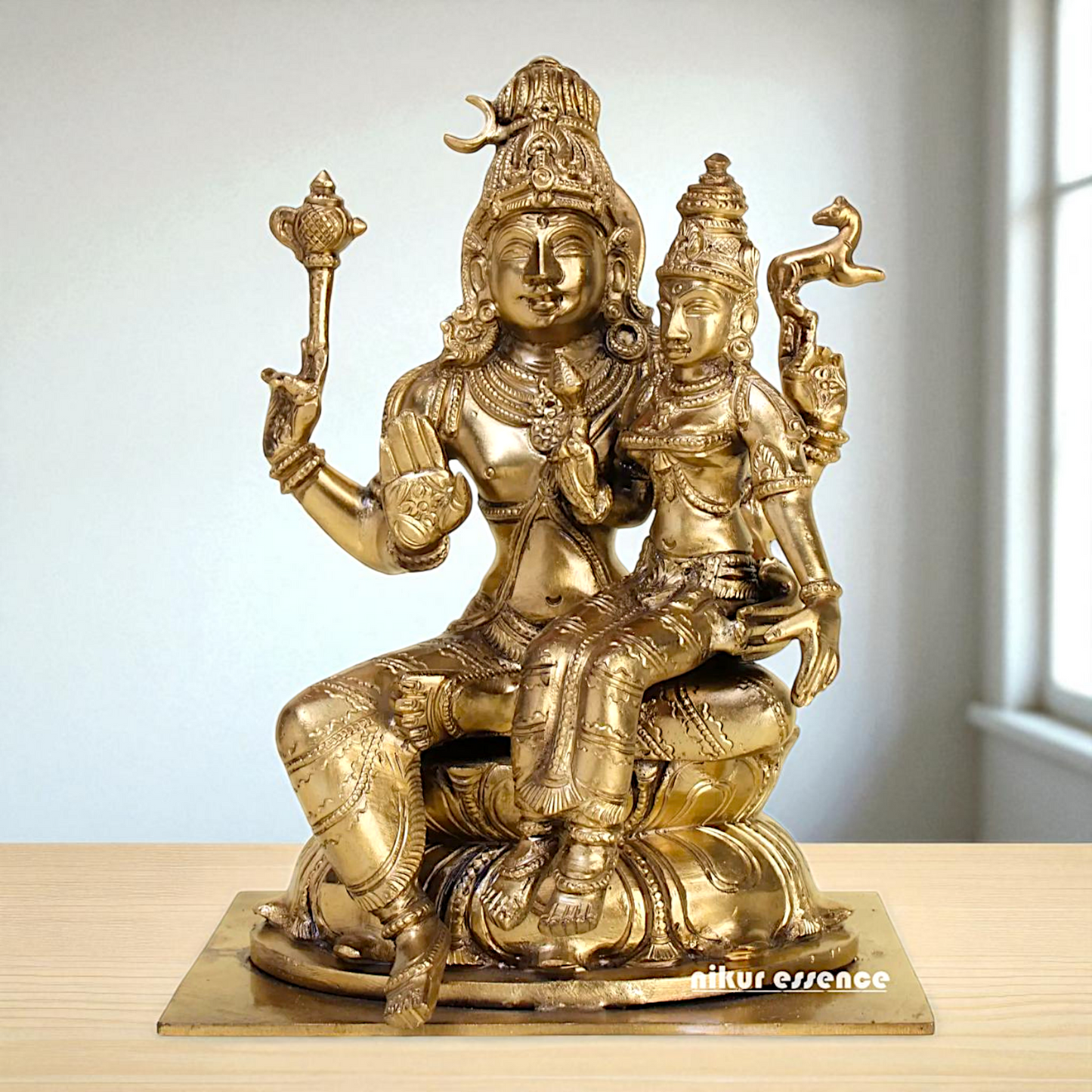 Pashupatinath shiva with Goddess Parvati Devi seated Blessing Bronze/Panchaloha idol - 8 Inches Nikuressence