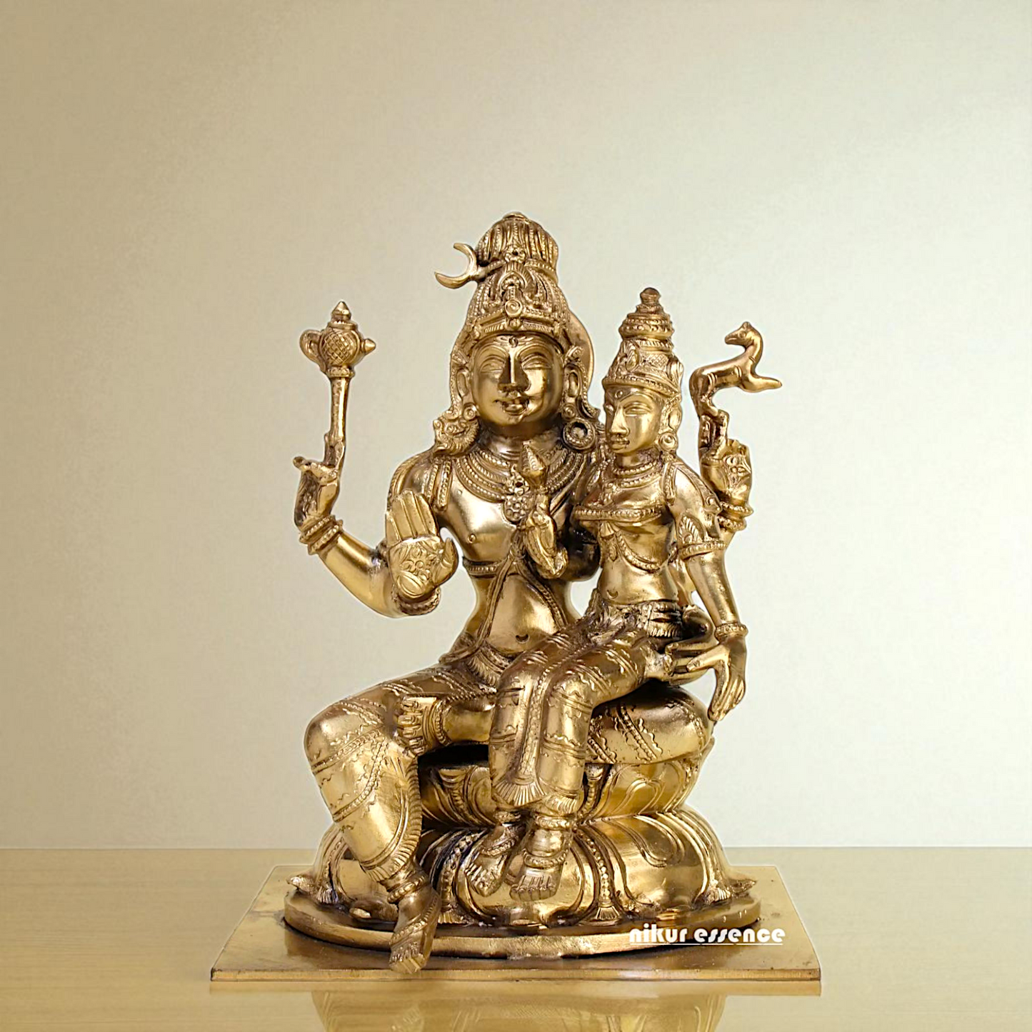 Pashupatinath shiva with Goddess Parvati Devi seated Blessing Bronze/Panchaloha idol - 8 Inches Nikuressence