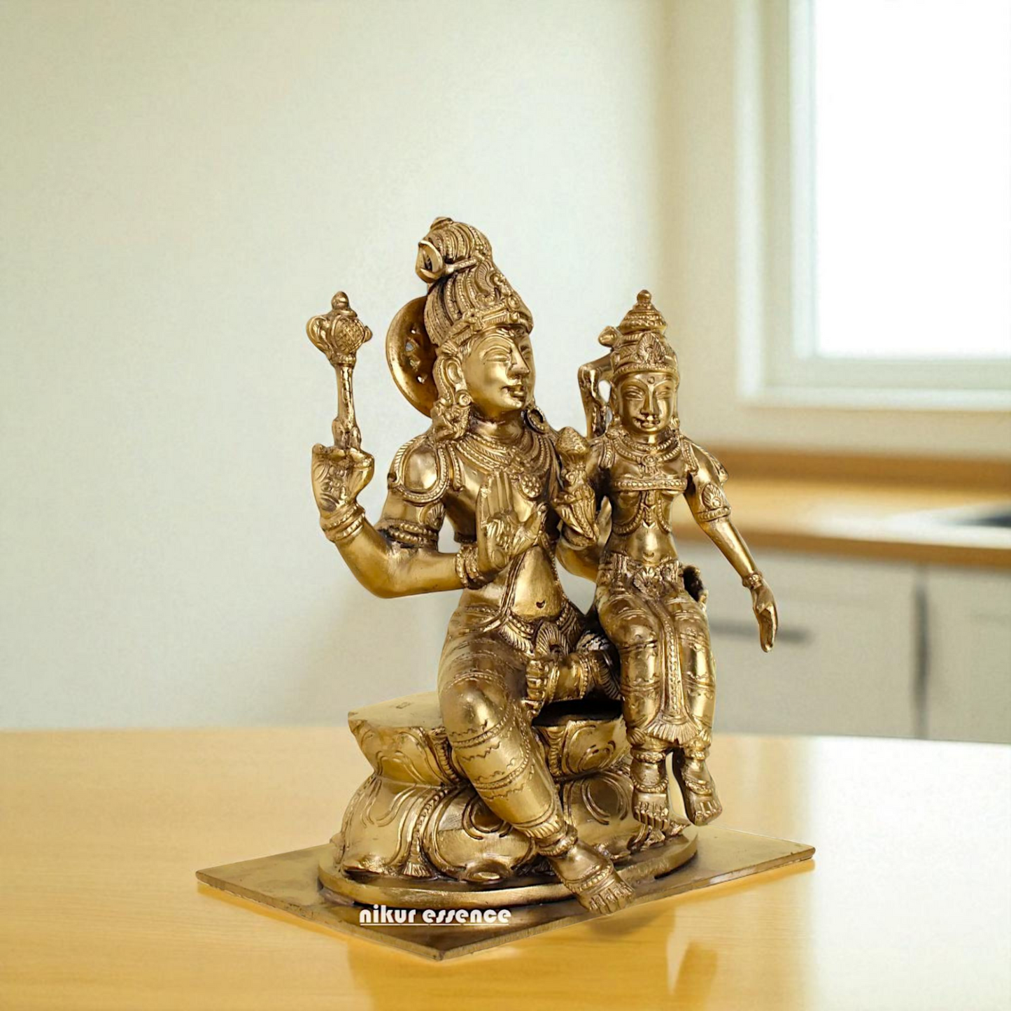 Pashupatinath shiva with Goddess Parvati Devi seated Blessing Bronze/Panchaloha idol - 8 Inches Nikuressence