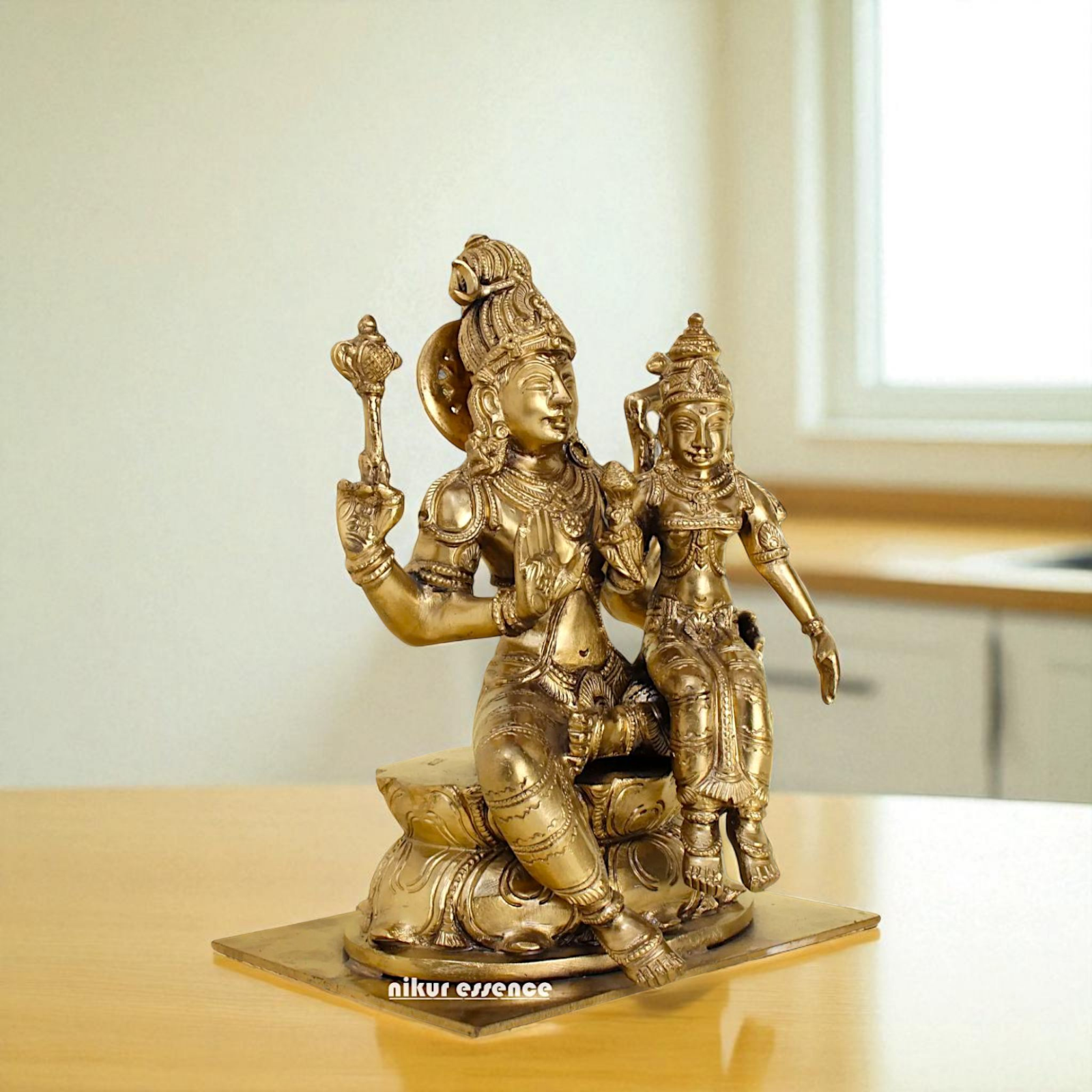 Pashupatinath shiva with Goddess Parvati Devi seated Blessing Bronze/Panchaloha idol - 8 Inches Nikuressence