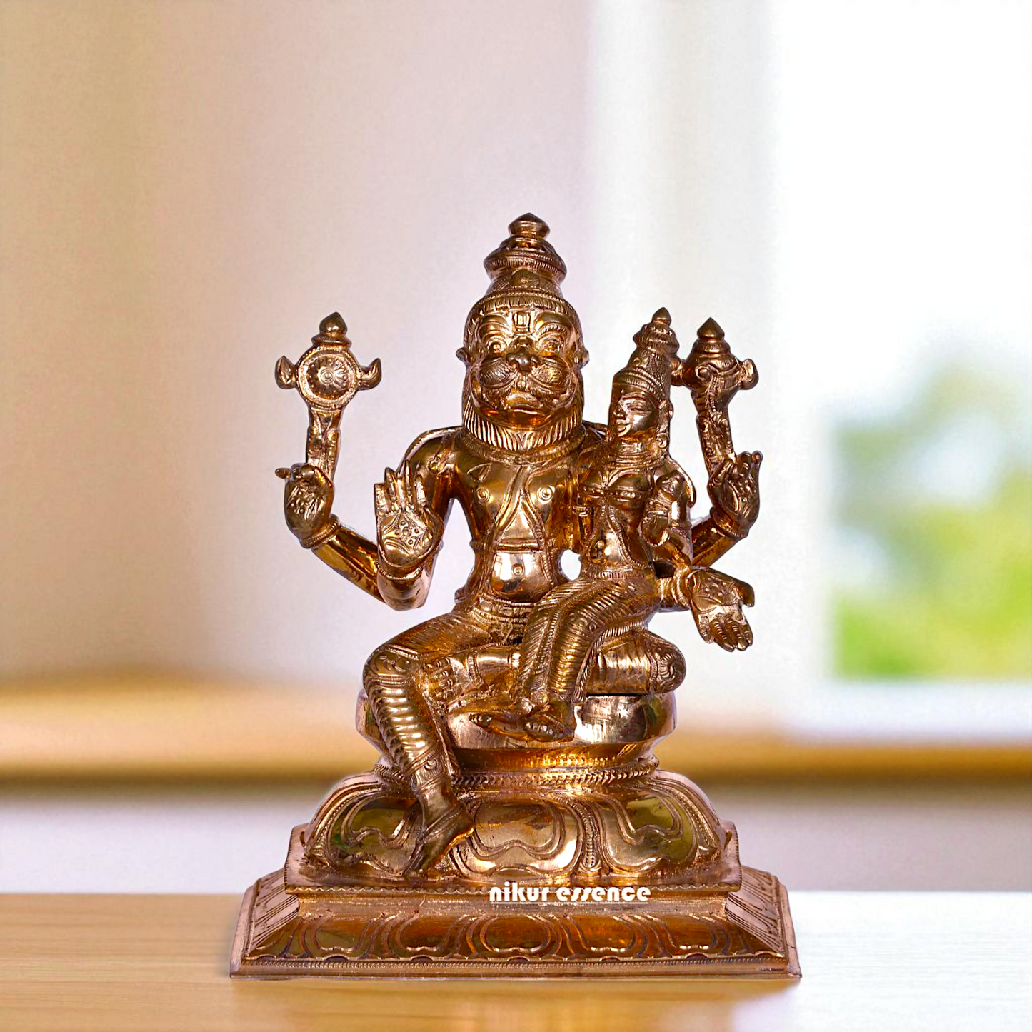 Narasimha Vishnu Bhagwan with Goddess Lakshmi seated Blessing Bronze/Panchaloha idol - 7 Inches Nikuressence