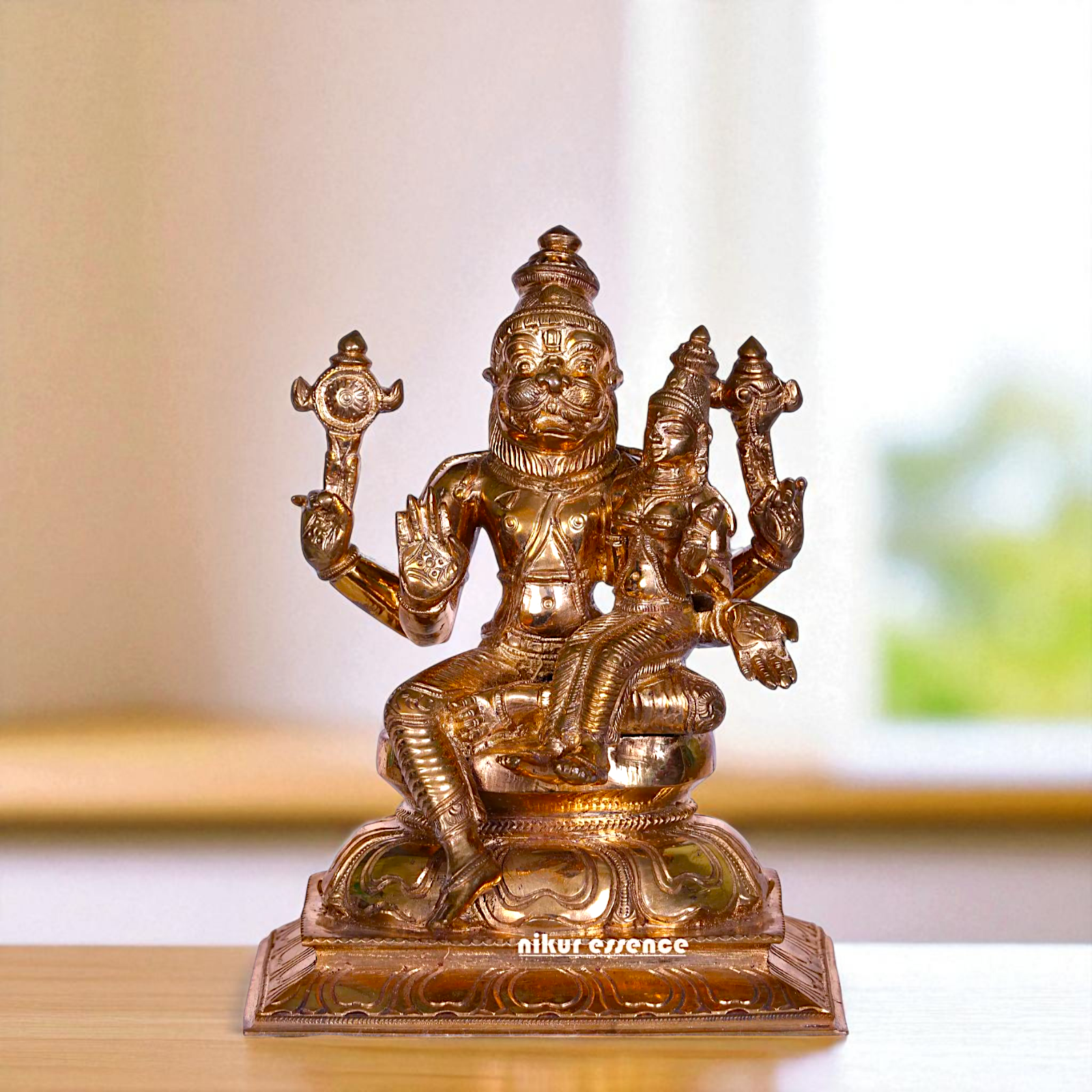 Narasimha Vishnu Bhagwan with Goddess Lakshmi seated Blessing Bronze/Panchaloha idol - 7 Inches Nikuressence