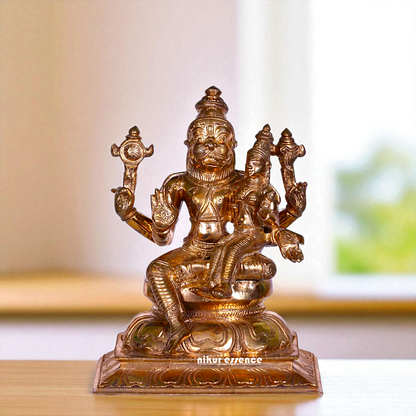 Narasimha Vishnu Bhagwan with Goddess Lakshmi seated Blessing Bronze/Panchaloha idol - 7 Inches Nikuressence