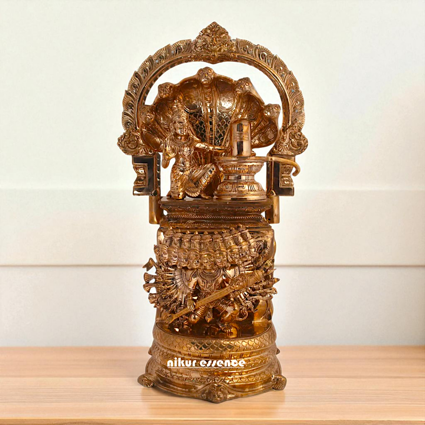 Nagapooshani Amman with sheshnag Shiva Linga and Ravan Bronze/Panchaloha idol - 18 Inches Nikuressence