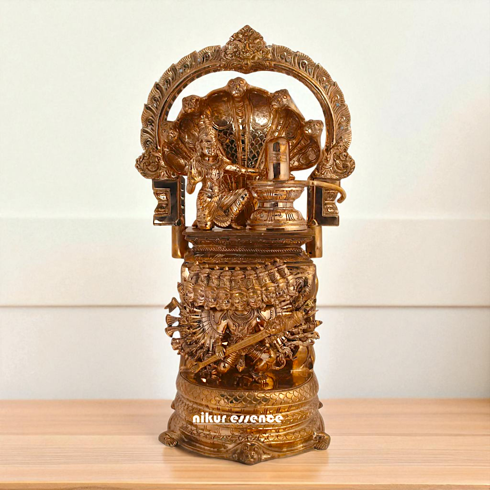 Nagapooshani Amman with sheshnag Shiva Linga and Ravan Bronze/Panchaloha idol - 18 Inches Nikuressence