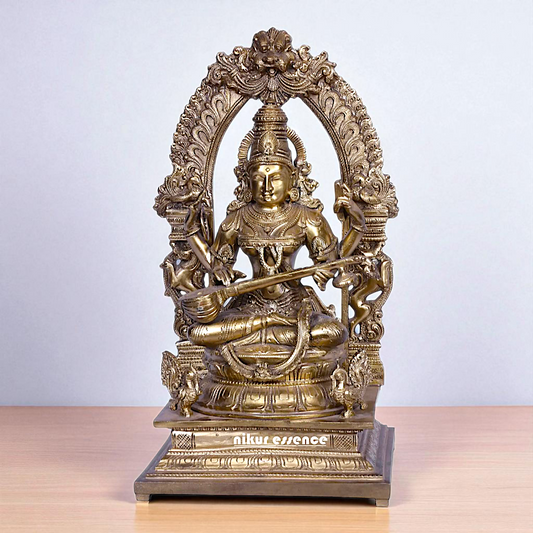 Goddess Saraswati Devi Seated on kirtimukha throne with Playing Veena Bronze/Panchaloha idol - 16 Inches Nikuressence