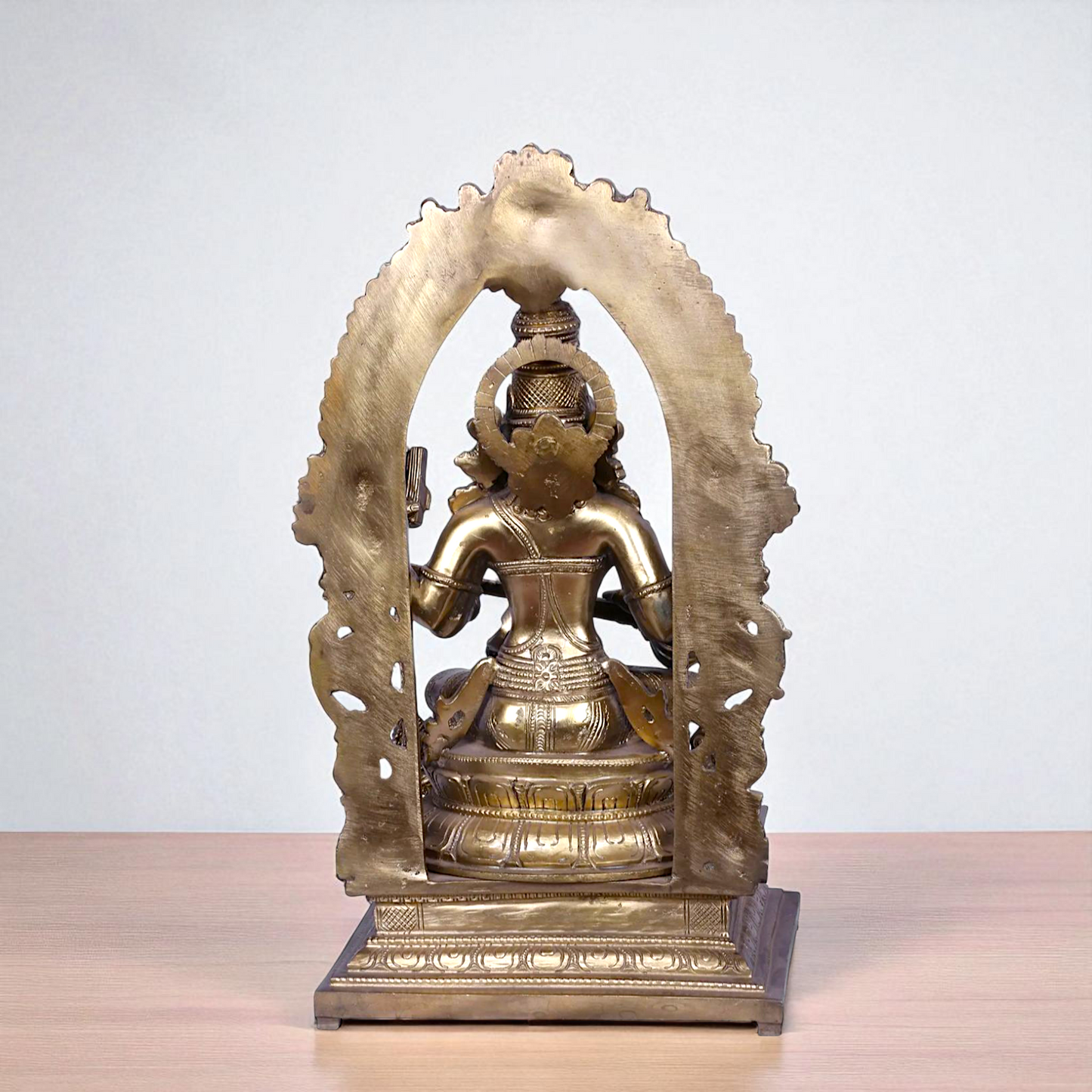 Goddess Saraswati Devi Seated on kirtimukha throne with Playing Veena Bronze/Panchaloha idol - 16 Inches Nikuressence