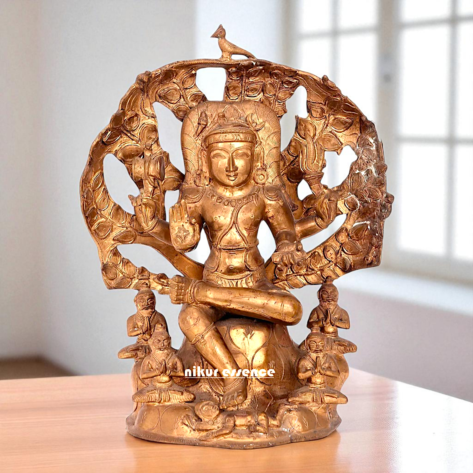 Dakshinamurti Shiva Seated on stone Bronze Panchaloha idol - 15 inches Nikuressence