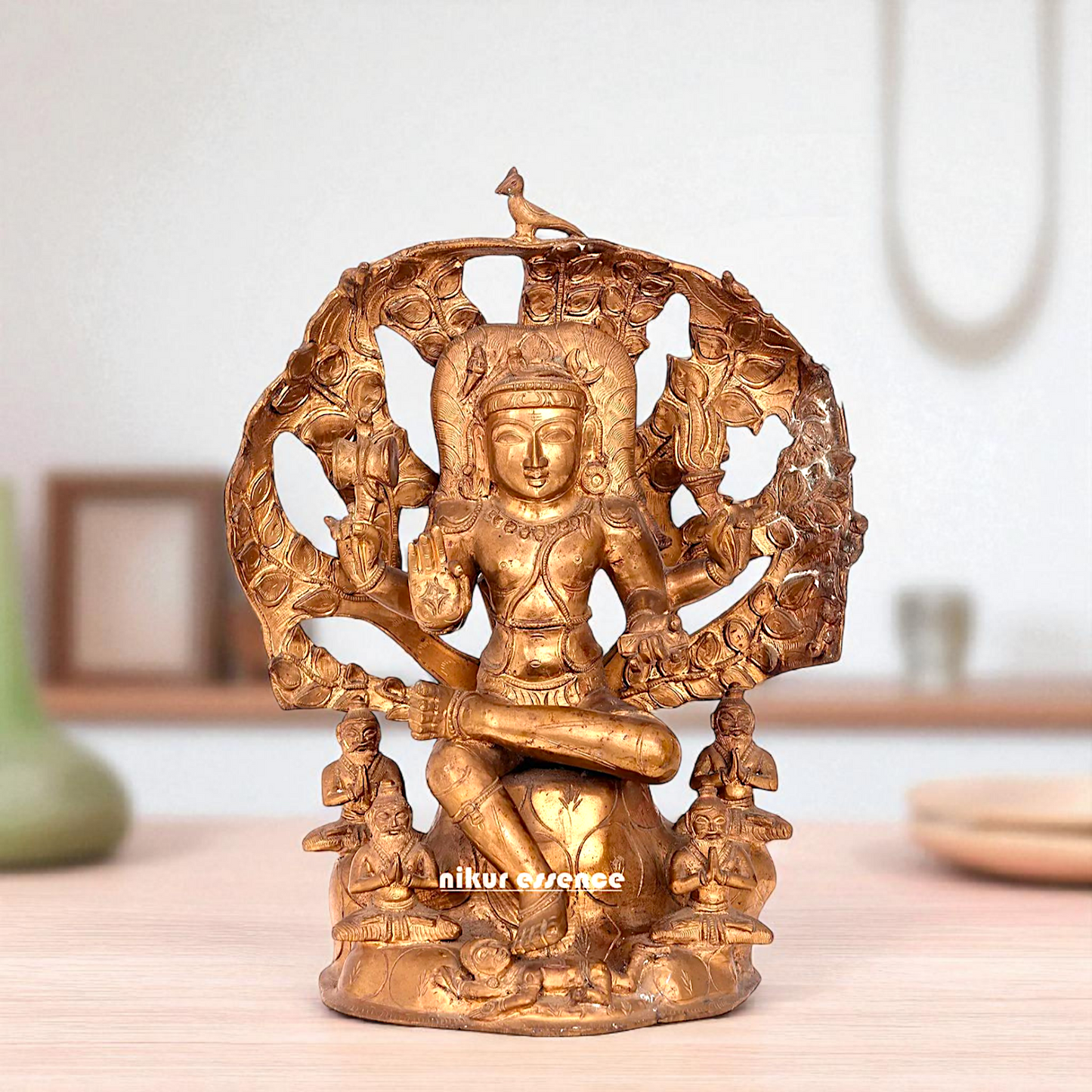 Dakshinamurti Shiva Seated on stone Bronze Panchaloha idol - 15 inches Nikuressence