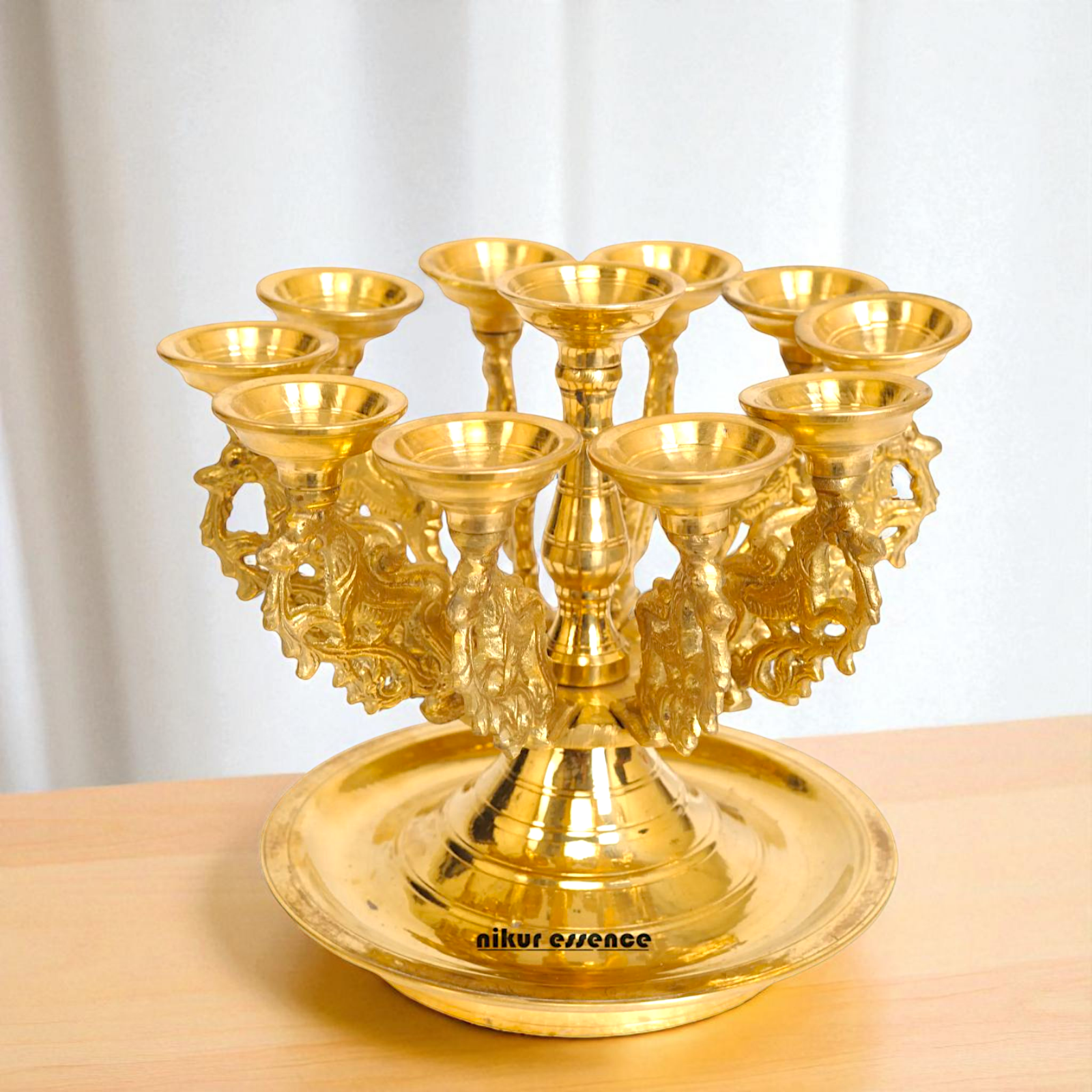 Eleven Diya lamps big Bronze/Panchaloha - 8 Inches Nikuressence