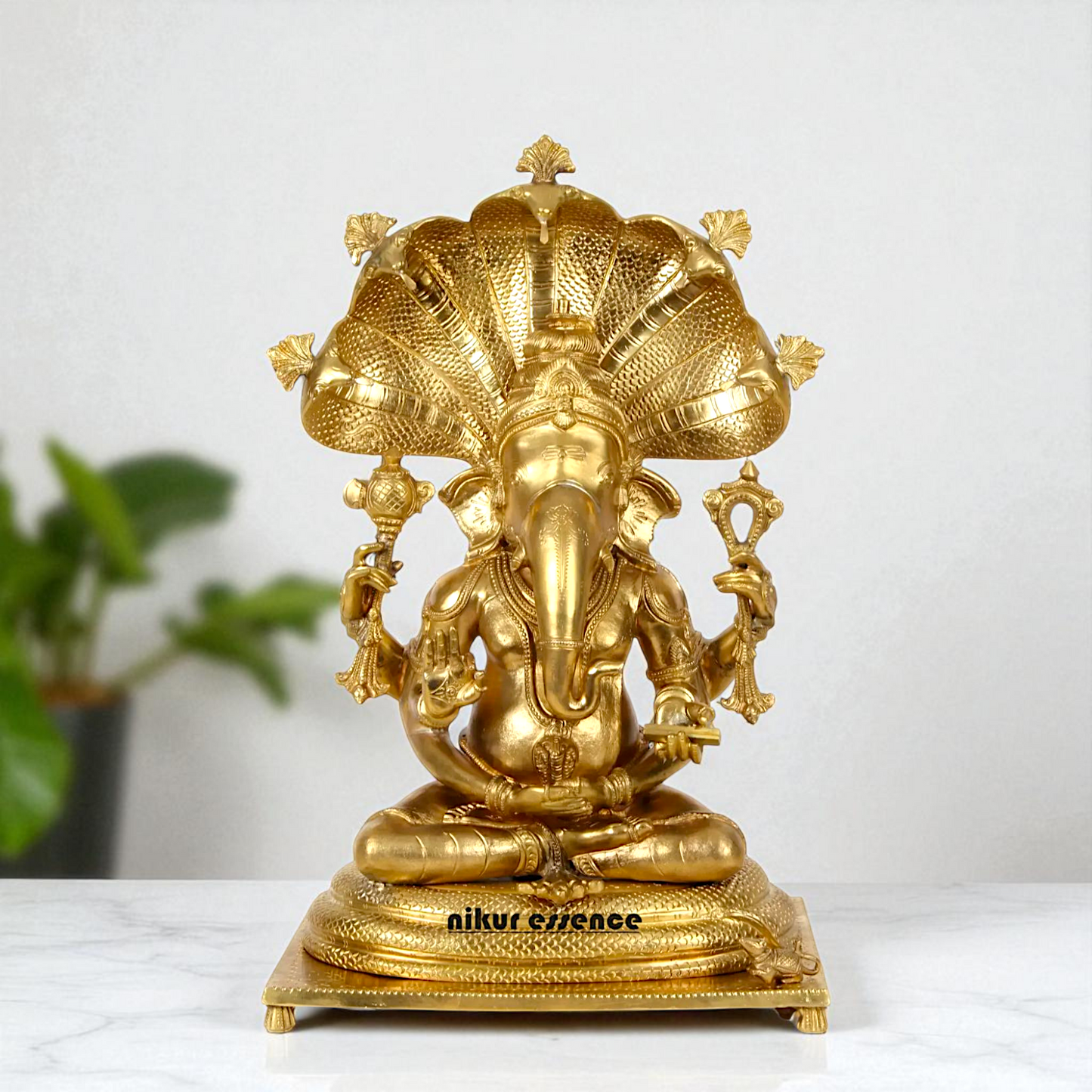 Bronze/Panchaloha Ganesha seated on sheshnag statue - 18 Inches Nikuressence