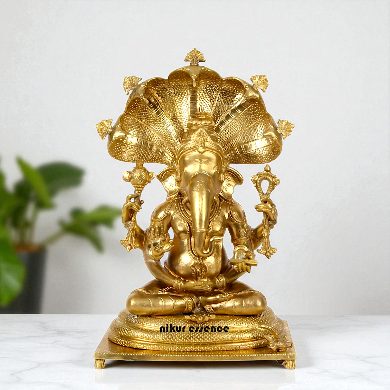 Bronze/Panchaloha Ganesha seated on sheshnag statue - 18 Inches Nikuressence