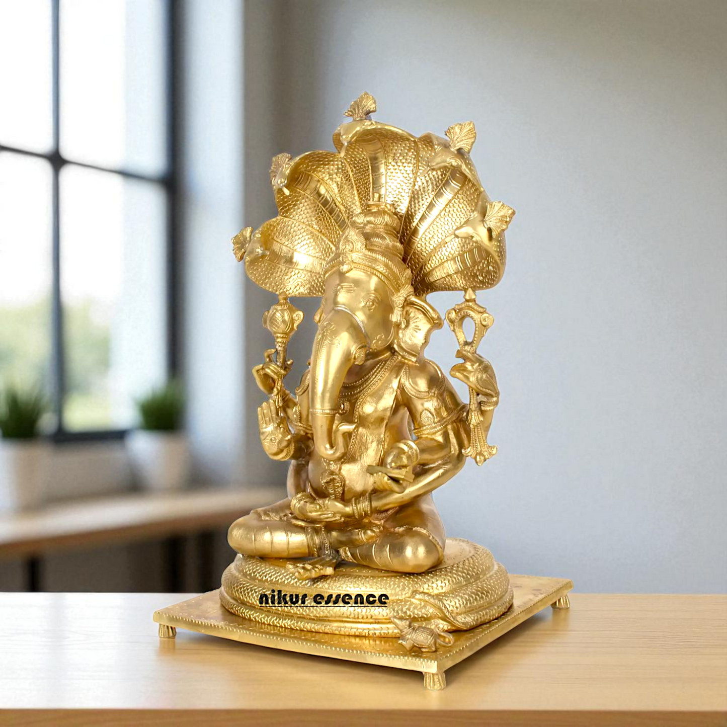 Bronze/Panchaloha Ganesha seated on sheshnag statue - 18 Inches Nikuressence