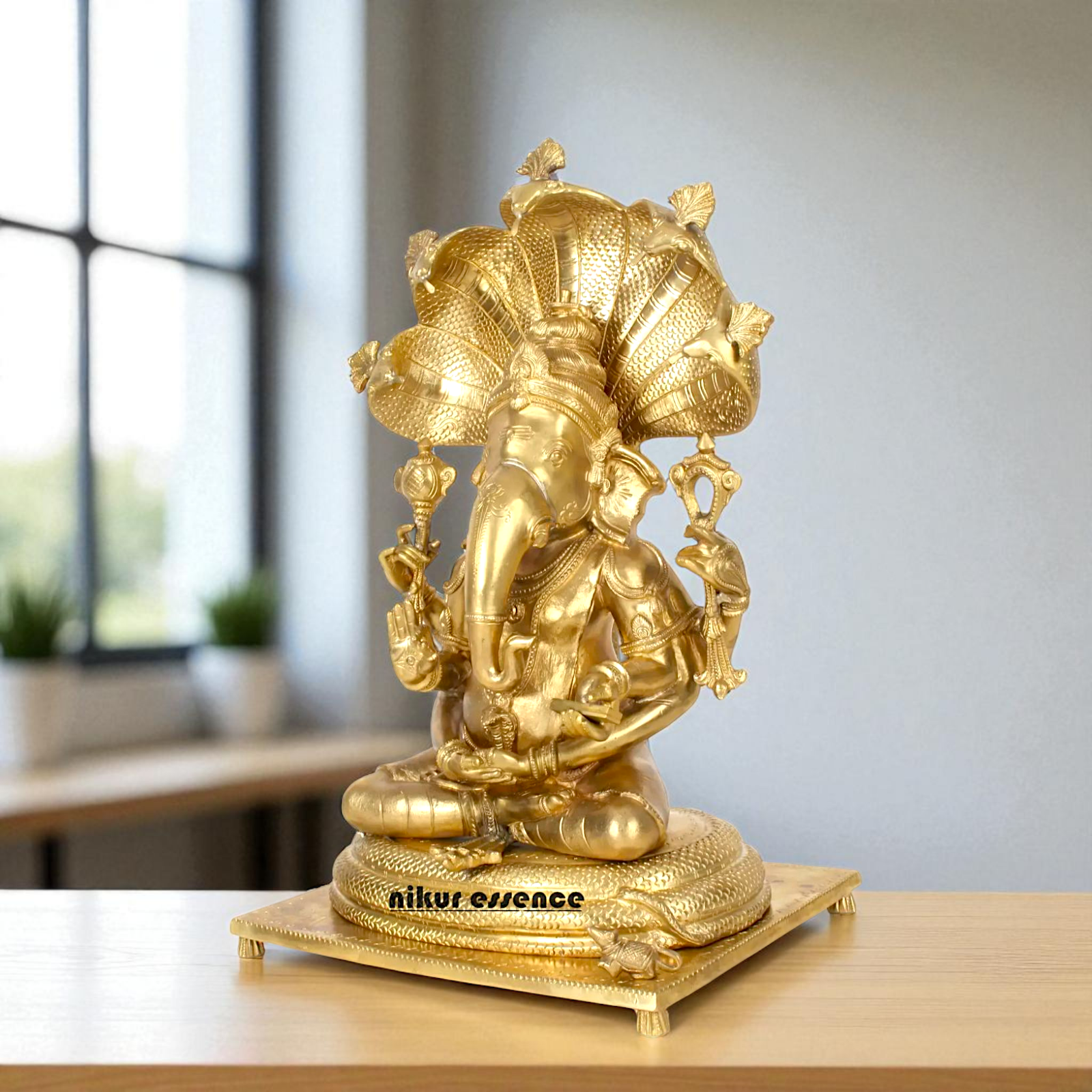 Bronze/Panchaloha Ganesha seated on sheshnag statue - 18 Inches Nikuressence