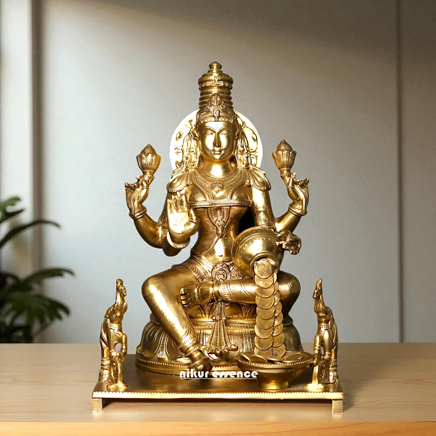 Sri Lakshmi Seated on throne with Blessing Bronze/Panchaloha idol - 16 Inches Nikuressence