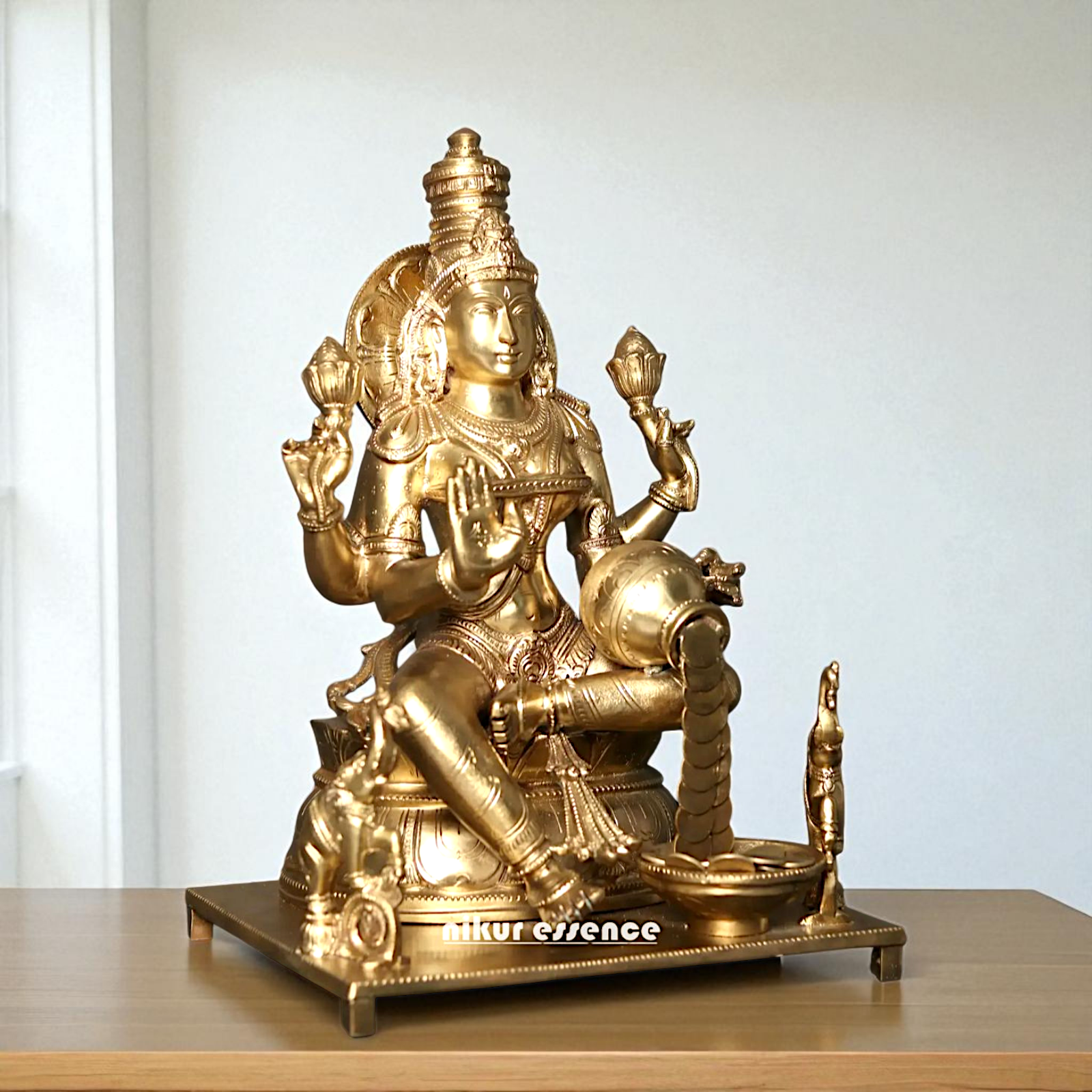 Sri Lakshmi Seated on throne with Blessing Bronze/Panchaloha idol - 16 Inches Nikuressence