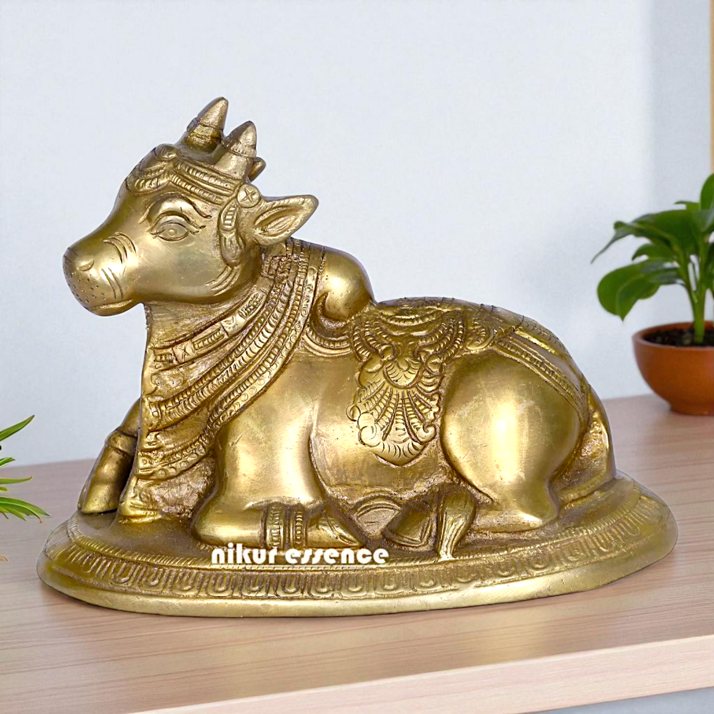 Nandi Bull Seated Bronze/Panchaloha idol - 6 Inches Nikuressence