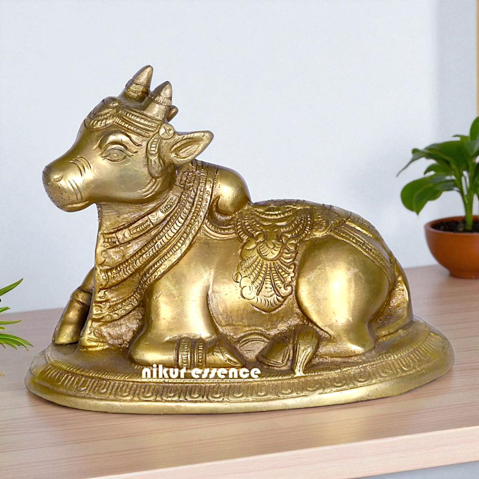Nandi Bull Seated Bronze/Panchaloha idol - 6 Inches Nikuressence