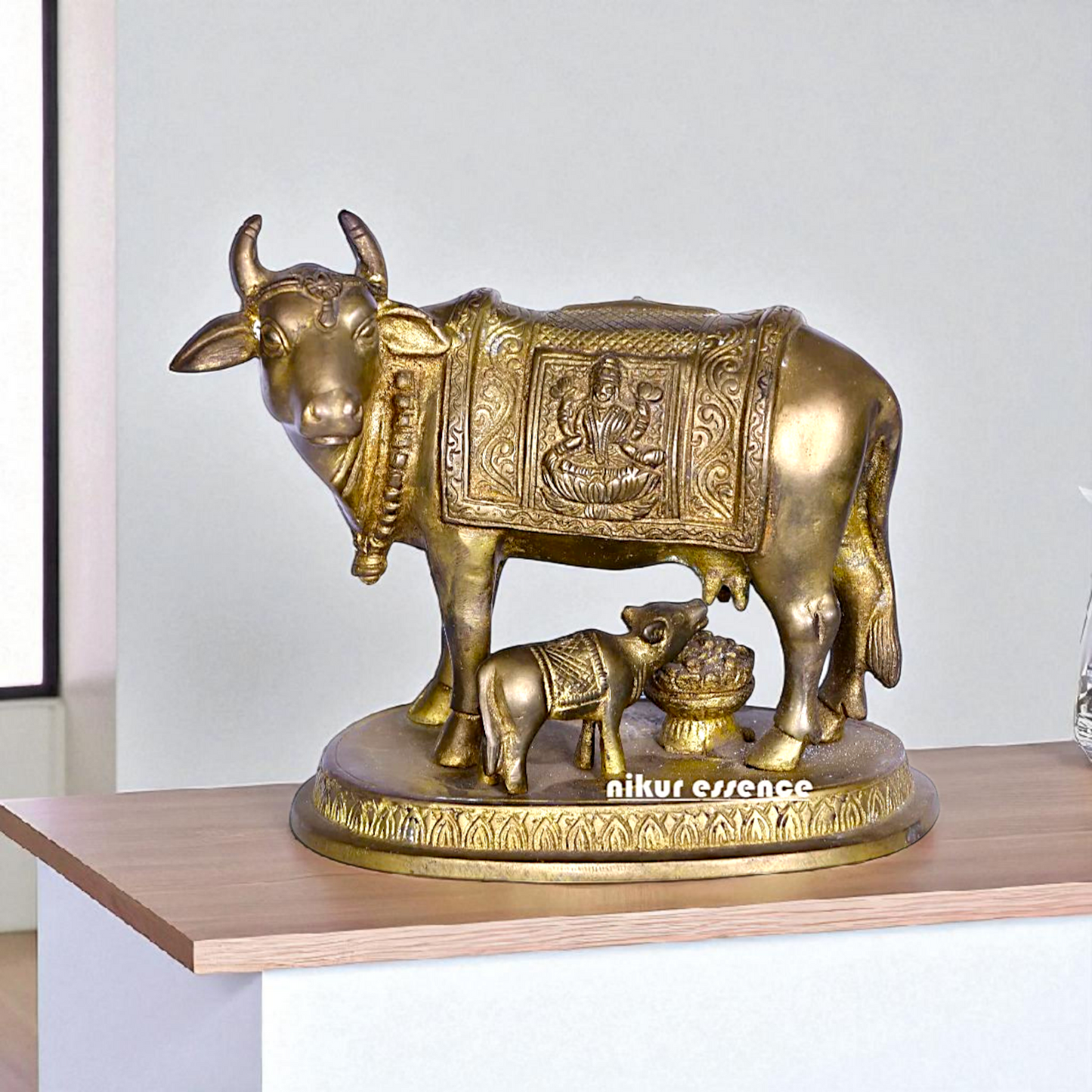Kamadhenu cow with Lakshmi and Calf Bronze Panchaloha idol - 5 Inches Nikuressence
