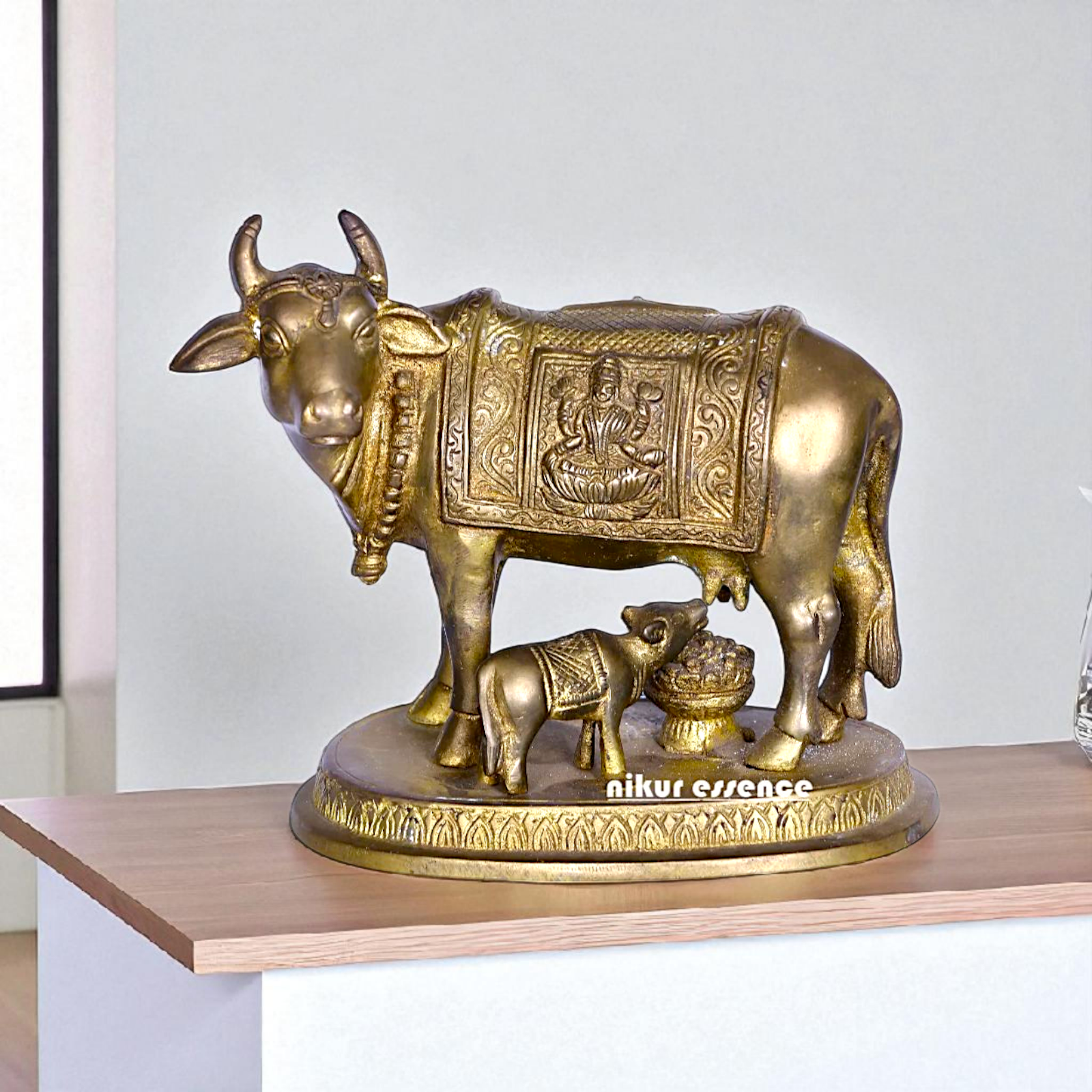 Kamadhenu cow with Lakshmi and Calf Bronze Panchaloha idol - 5 Inches Nikuressence
