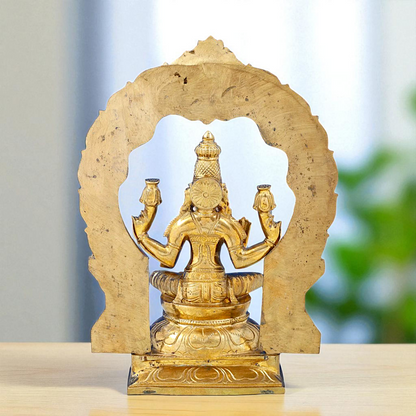 Dhan Lakshmi seated on kirtimukha throne with Blessing Bronze Panchaloha idol - 1 Feet Nikuressence