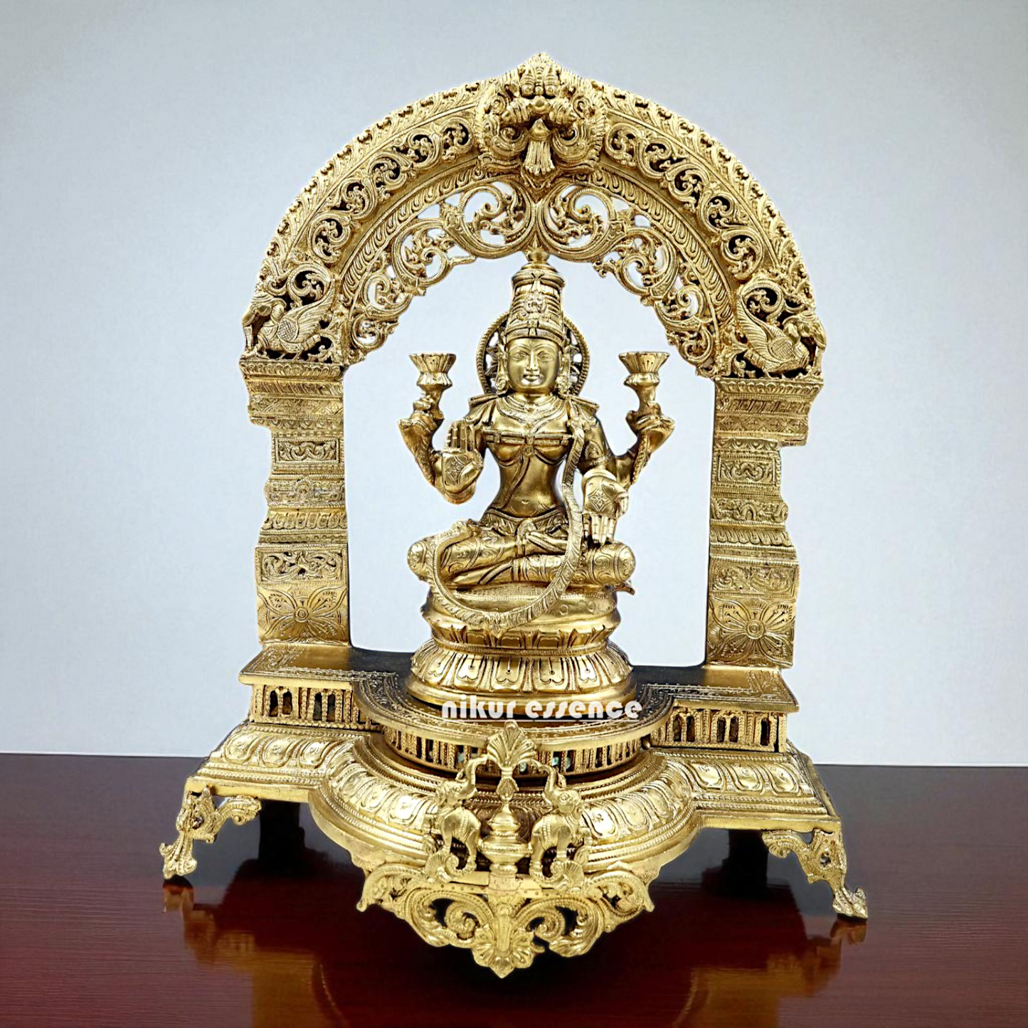 Maha Lakshmi Seated on throne with Blessing Bronze Panchaloha idol - 21 Inches Nikuressence