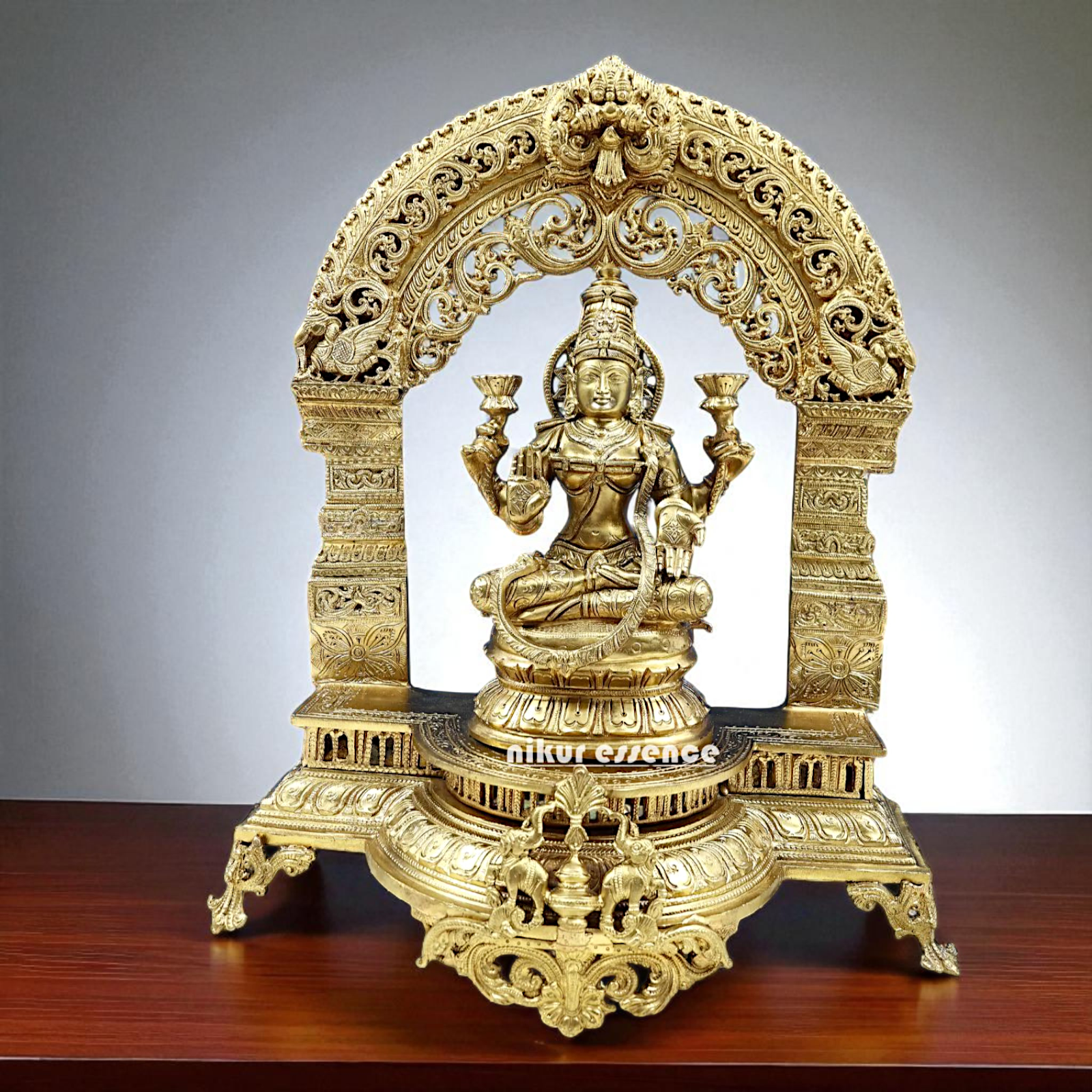 Maha Lakshmi Seated on throne with Blessing Bronze Panchaloha idol - 21 Inches Nikuressence