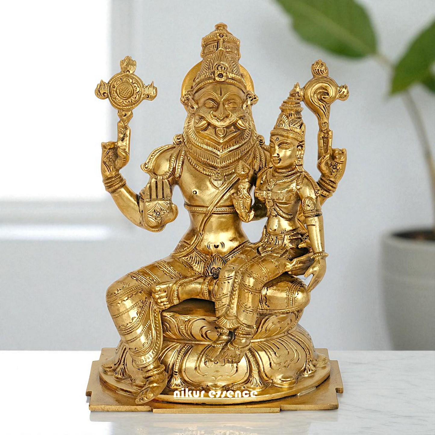 Narasimha Vishnu Bhagwan with Lakshmi seated Blessing Bronze Panchaloha idol - 9 Inches Nikuressence