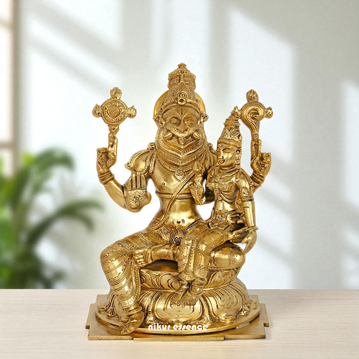 Narasimha Vishnu Bhagwan with Lakshmi seated Blessing Bronze Panchaloha idol - 9 Inches Nikuressence
