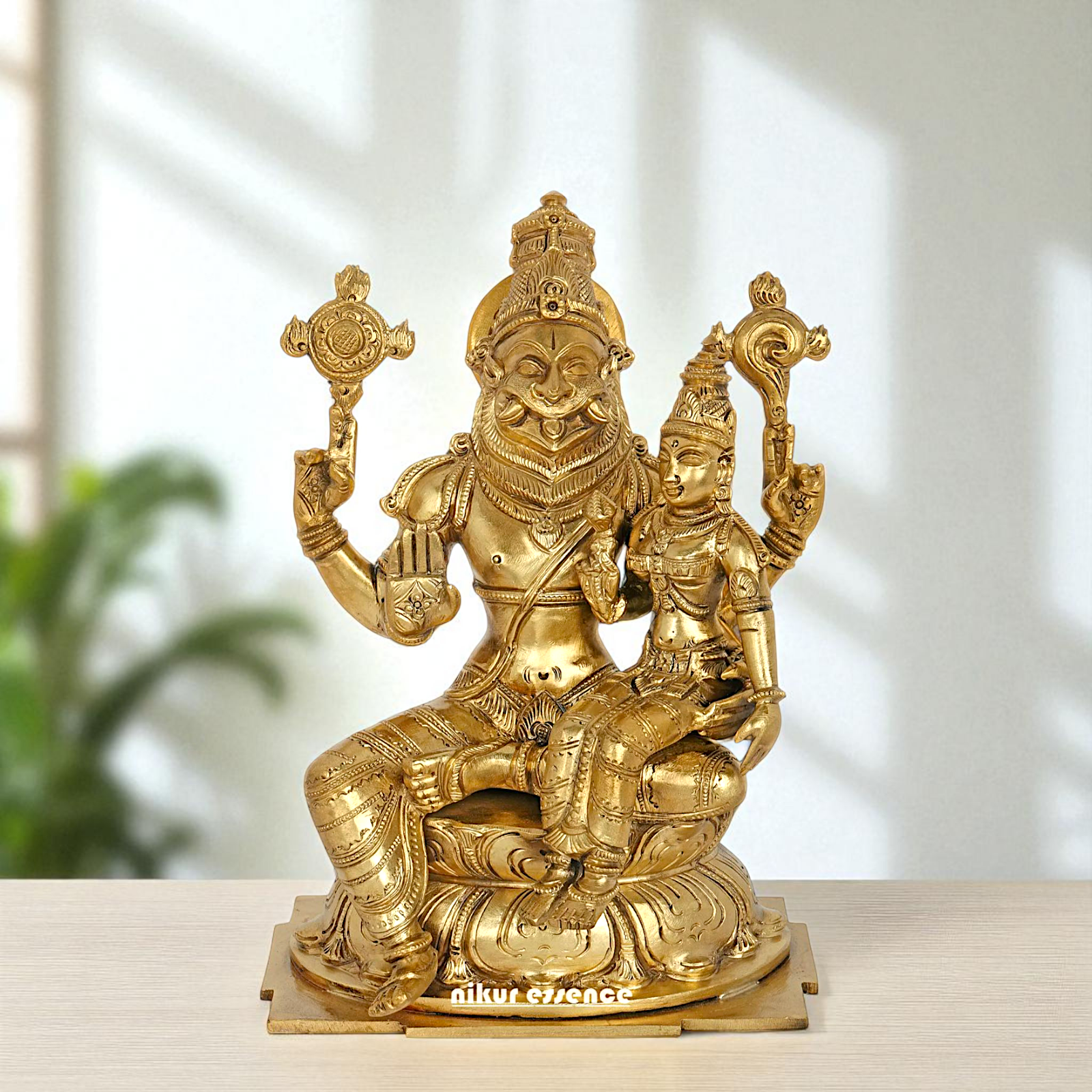 Narasimha Vishnu Bhagwan with Lakshmi seated Blessing Bronze Panchaloha idol - 9 Inches Nikuressence
