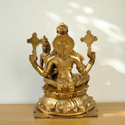 Narasimha Vishnu Bhagwan with Lakshmi seated Blessing Bronze Panchaloha idol - 9 Inches Nikuressence