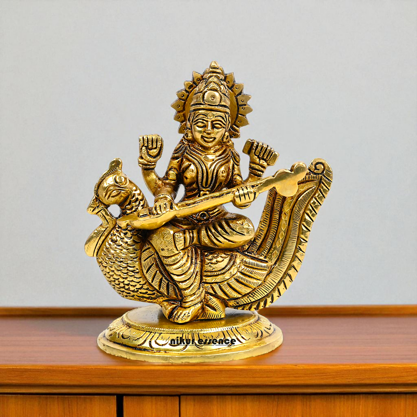 Goddess Saraswati Maa Seated on swan with Playing veena brass idol - 4 Inches Nikuressence