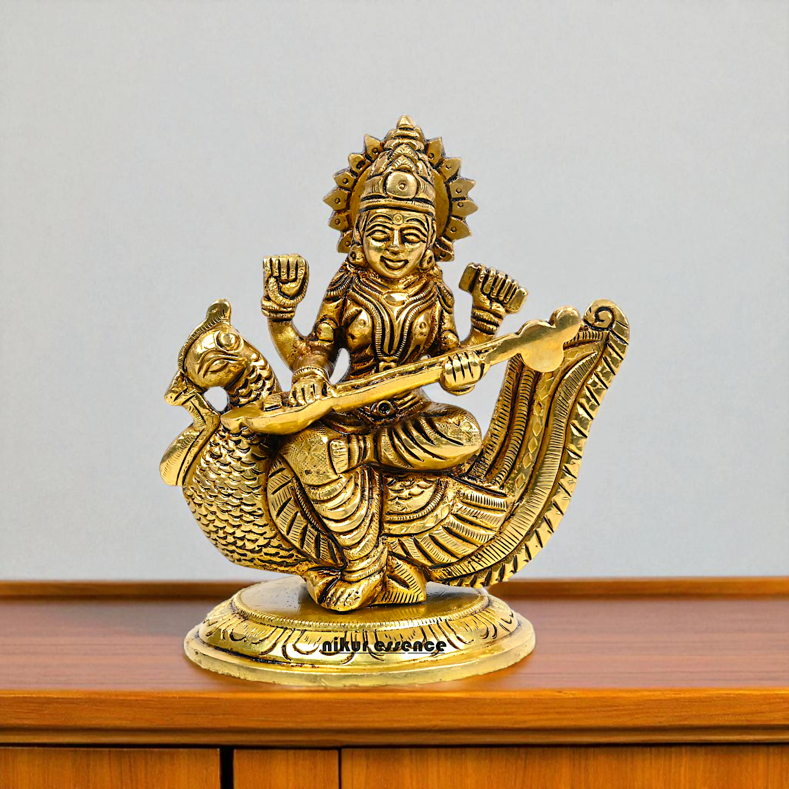 Goddess Saraswati Maa Seated on swan with Playing veena brass idol - 4 Inches Nikuressence