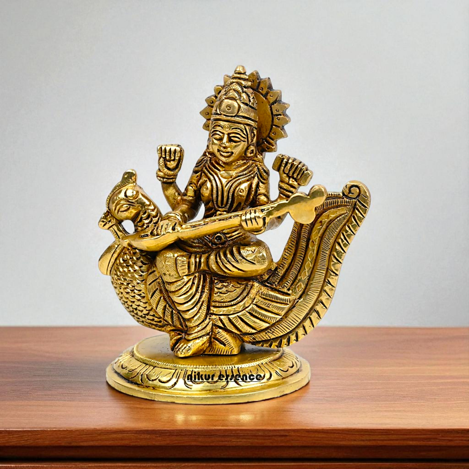 Goddess Saraswati Maa Seated on swan with Playing veena brass idol - 4 Inches Nikuressence