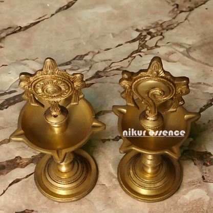 Buy Pair Conch and Chakra Diya Lamp - 8 Inches Nikuressence