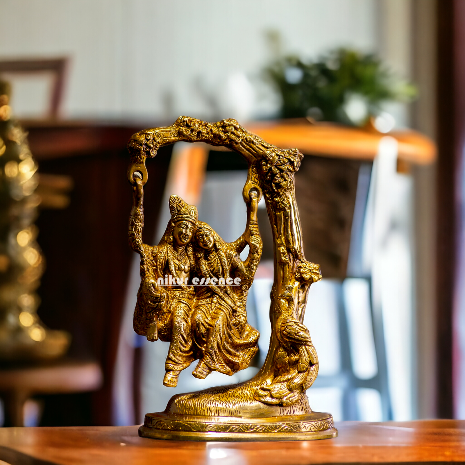 Solid Brass Radha Krishna swinging Jhula Idol - 10 inches Nikuressence