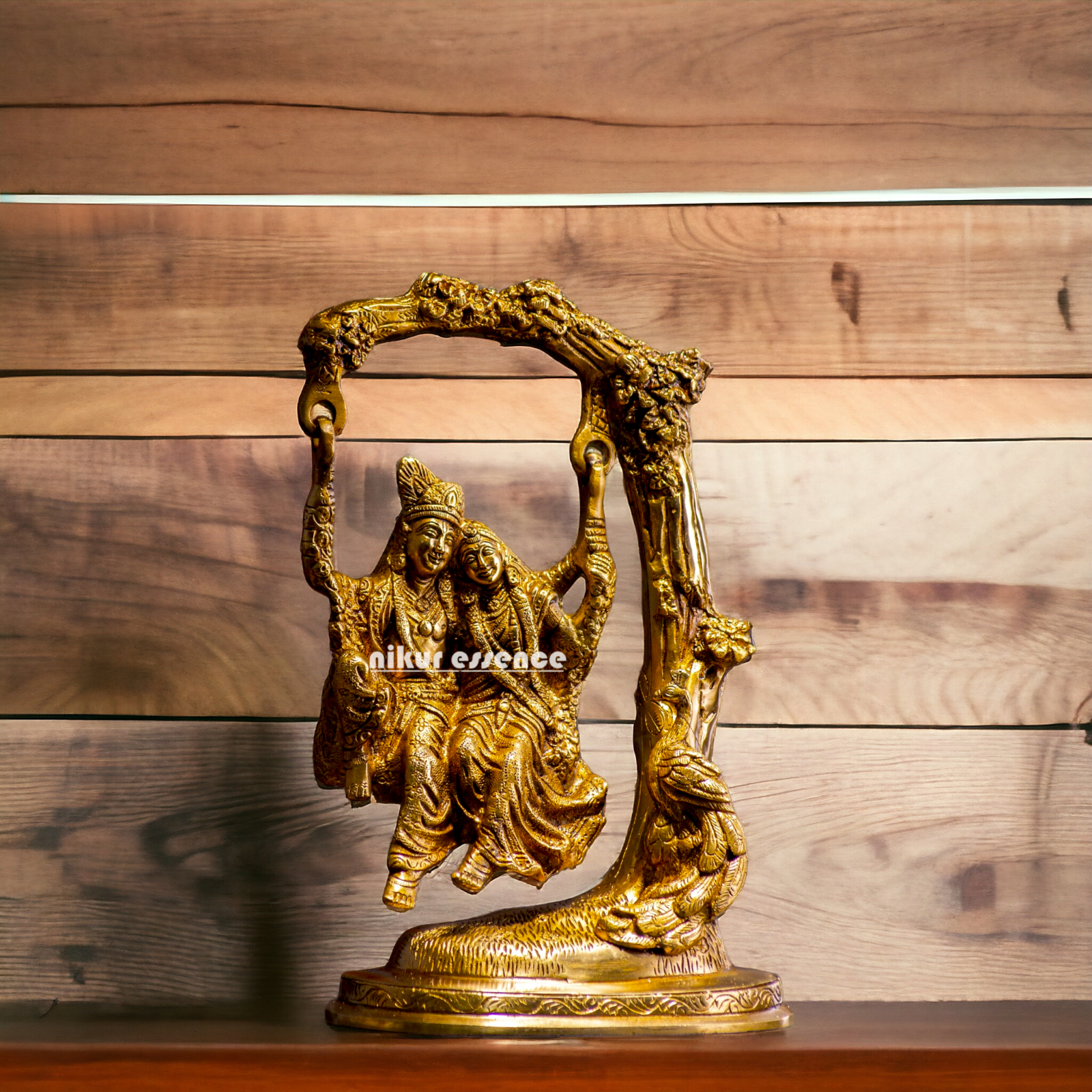 Solid Brass Radha Krishna swinging Jhula Idol - 10 inches Nikuressence