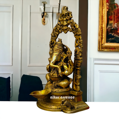 Brass Ganesha Idol With diya - 8.9 inches Nikuressence