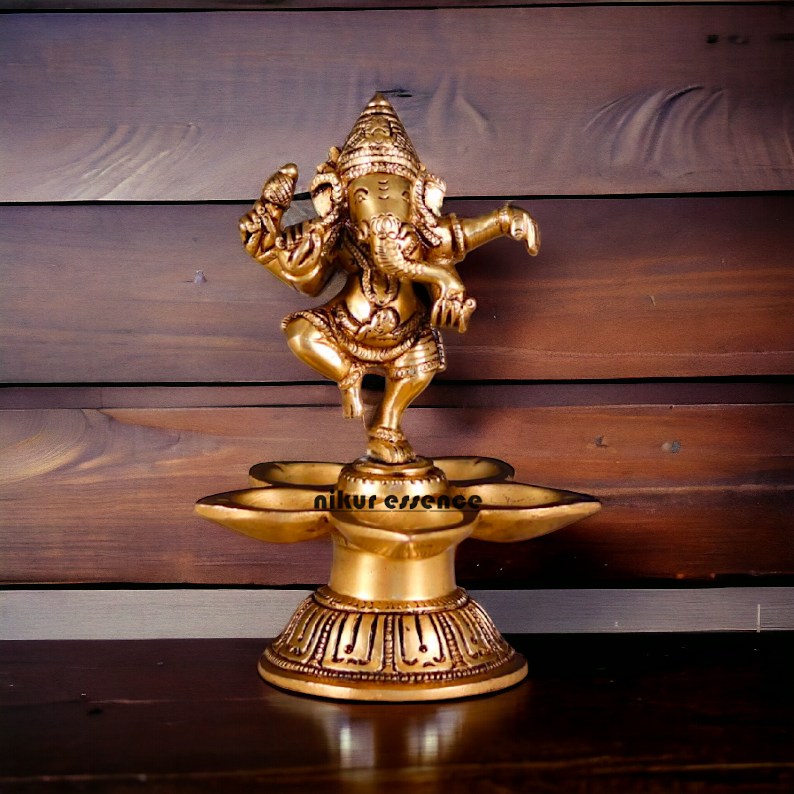 Ganesha Dancing with diya Pital brass - 5.5 Inches Nikuressence