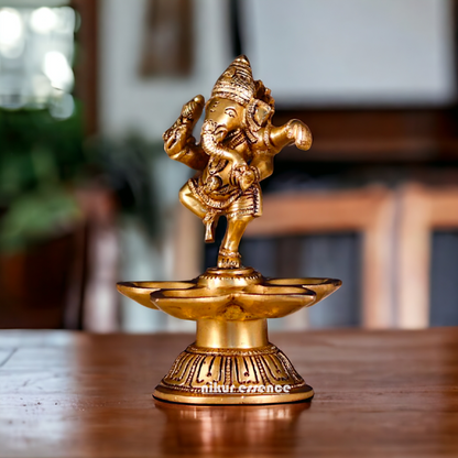 Ganesha Dancing with diya Pital brass - 5.5 Inches Nikuressence