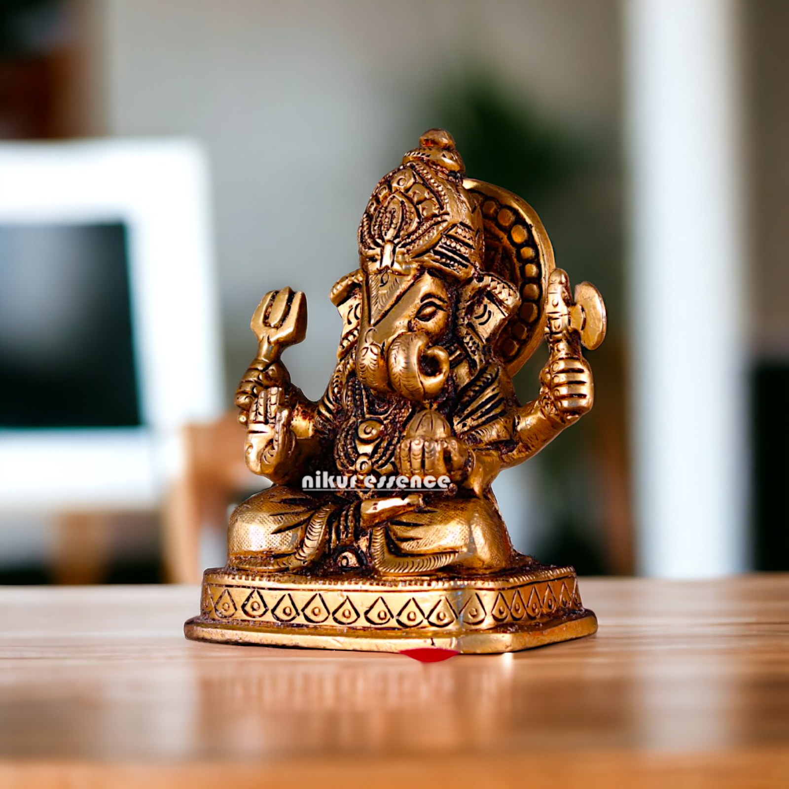 Brass Ganesha Ganpati Seated pital murti - 4 inches Nikuressence