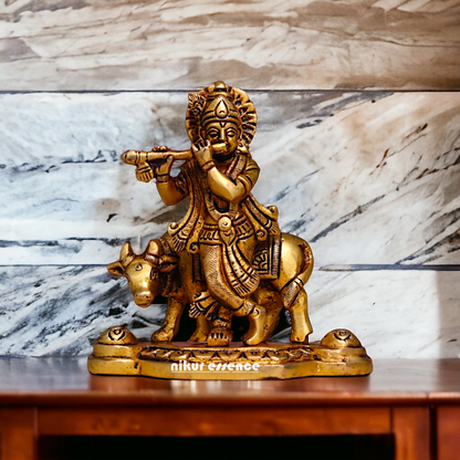 Pital Krishna Bhagwan Cow with Playing Flute Brass Idol - 4.2 inches Nikuressence