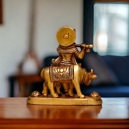 Pital Krishna Bhagwan Cow with Playing Flute Brass Idol - 4.2 inches Nikuressence