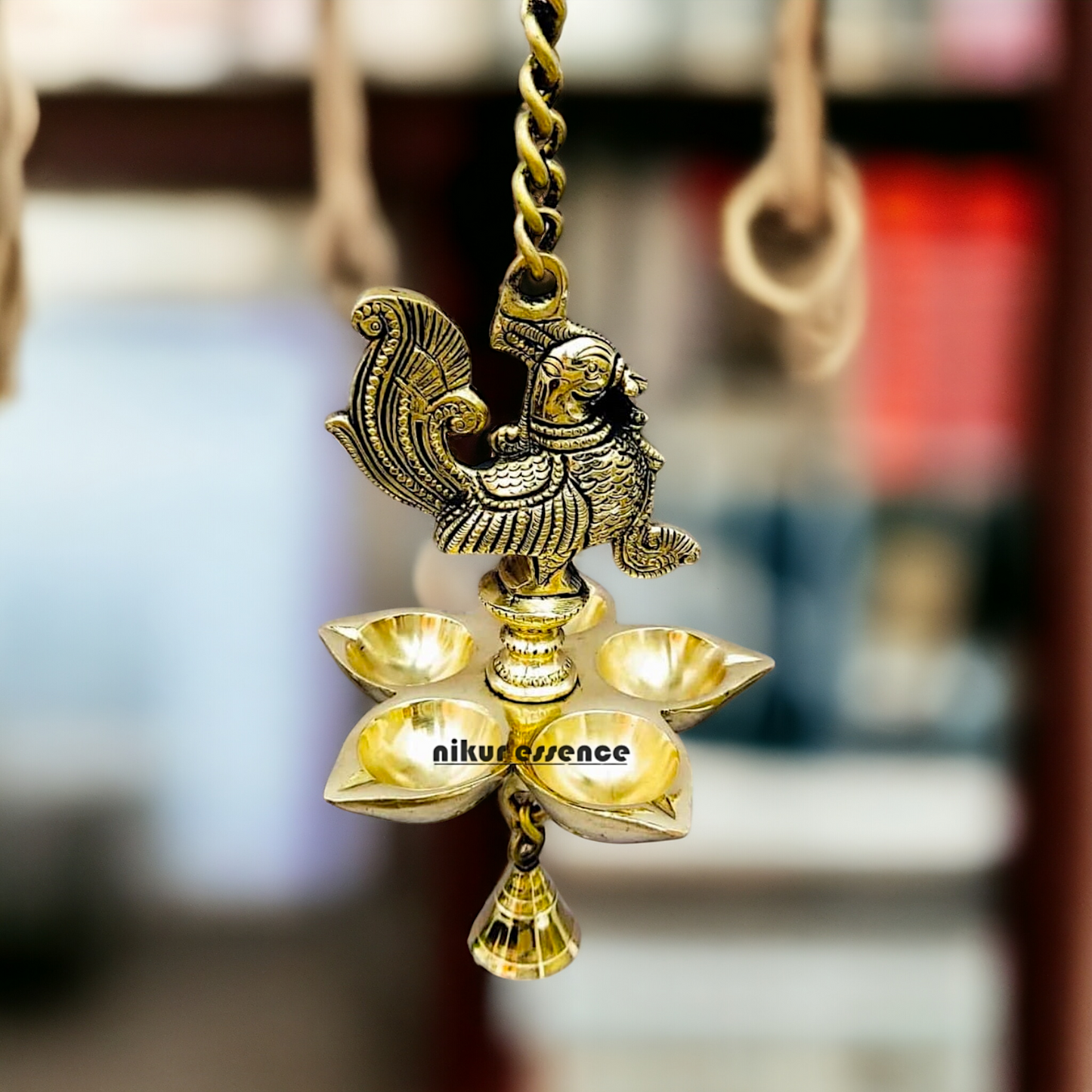 Brass Peacock wall Hanging with five diya and Bell - 25 inches Nikuressence