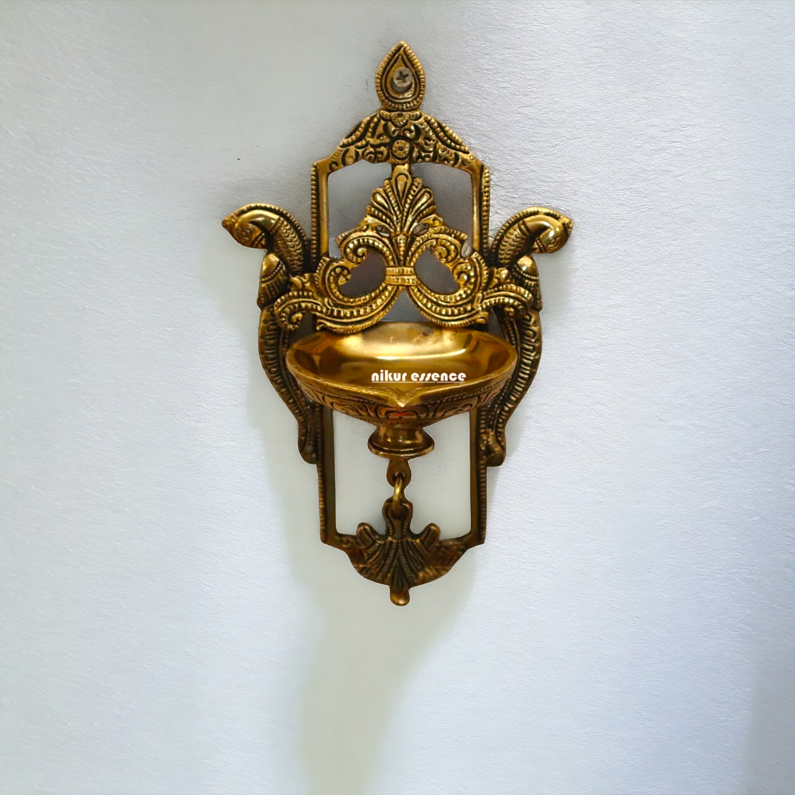 Peacock Diya wall hanging brass - 9 inches Nikuressence