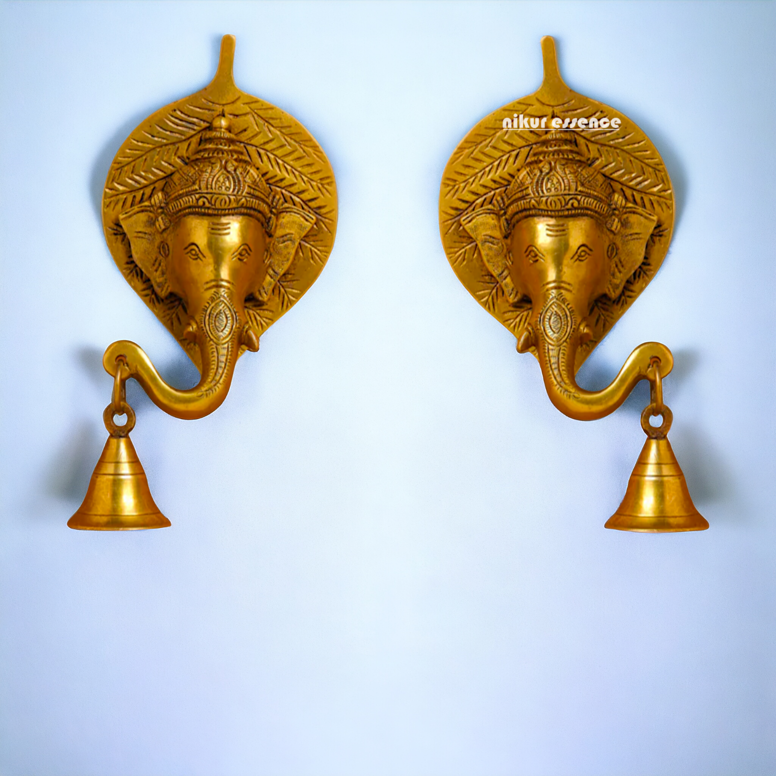 Ganesha on leaf with Bells brass wall hanging idol - 7.5 Inches Nikuressence