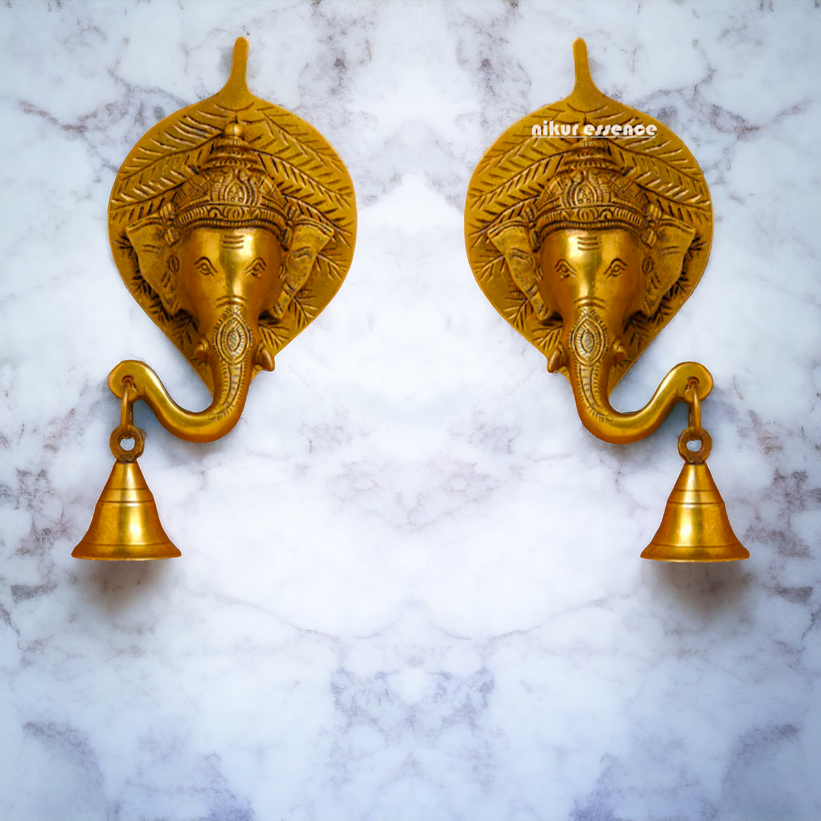 Ganesha on leaf with Bells brass wall hanging idol - 7.5 Inches Nikuressence